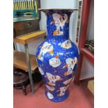 A XX Century Chinese Floor Standing Vase, with a blue ground, decorated with female figures on a