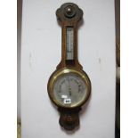 A Oak Cased Banjo Barometer, circa 1920's with poker work carving, thermometer to neck, silvered