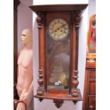 A Late XIX Century Walnut Cased Vienna Wall Clock, ivorine dial, Roman numerals, moulded cornice (