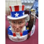 A Royal Doulton "Uncle Sam" Jim Beam Whiskey Advertising Flask, 13.5cm high (empty).