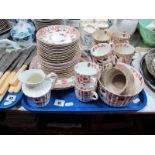 An Edwardian Tea Service, in the 'Pagoda' pattern of thirty-nine pieces:- One Tray