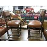 A Set of Four Oak Dining Chairs, with brown leather back and seat panels with stud decoration, on