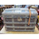 An Early XX Century Domed Top Trunk, with iron wood strapwork.