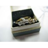 A Three Stone Diamond Ring, the graduated old cut stones claw set, stamped "18ct"; together with a