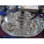 An EPNS Three Piece Tea Service, together with an oval shaped tray with a pierced border.