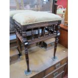 Edwardian Mahogany Stool, upholstered top, turned spindles on top turned legs.