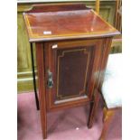 An Edwardian Inlaid Mahogany Pot Cupboard, with shaped back.