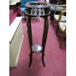 An Early XIX Century Walnut Jardiniere Stand, with spindle decoration to circular top, stepped under