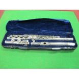 A 'Lindo' Three Section Chrome Flute, in plush lined hard protective case.