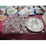 A Set of Twelve Cut Glass Wine Glasses; together with six cut glass tots on plated stand:- One Tray