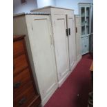 Three Painted White Cupboard, with panelled doors, plinth bases.