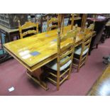 A XX Century Pine Rectory Table, with a rectangular top, on trestle supports; together with a four