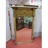 Regency XIX Century Gilt Wall Mirror, the breakfront top having X, figural and bauble decoration,