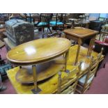 A Yew Wood Oval Shaped Coffee Table, with a moulded top, on turned legs, with undertier, together