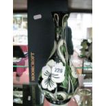 A Moorcroft Pottery Bulbous Vase, featuring white flowers and green leaves in stylised Art Nouveau