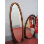 An Early XX Century Oval Shaped Mirror, with a bevelled glass, together with one other oval shaped