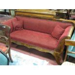 A XIX Century Mahogany Framed Continental Settee, in the Biedermeier style with shaped apron,