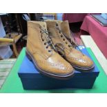 A Pair of Gent's Tricker's Tan Leather Brogue Lace-up Boots, size 9.5, unworn (boxed).
