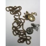 A XIX Century Style Long Chain, with sliding heart, an oval locket on chain and a hallmarked