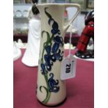 A Moorcroft Pottery Jug decorated with the Bluebell Harmony Design by Kerry Goodwin, impressed and