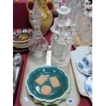 A XIX Century Parian Figure of a Flower Girl, mallet decanter, two plates and biscuit dish having