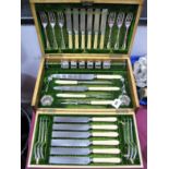 An Oak Cased Canteen of Plated Cutlery, the hinged interior fitted with knives, forks, set of six