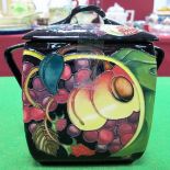 A Moorcroft Pottery Square Lidded Box, decorated with the Queen's Choice design by Emma Bossons,