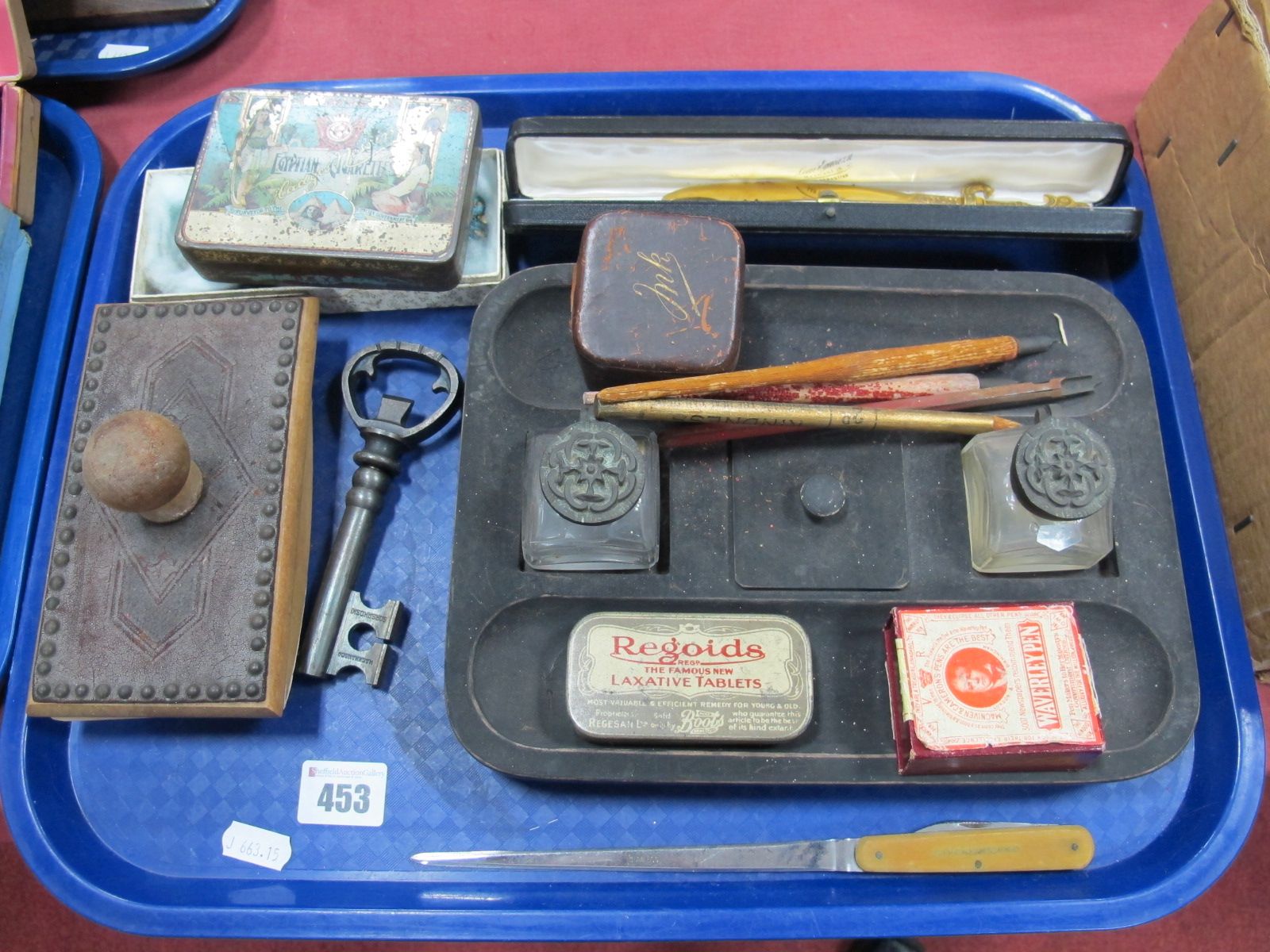 A Jennens & Bettridge Desk Stand, travel inkwell, Waverley pen nibs, Alfred Howard & Co. letter