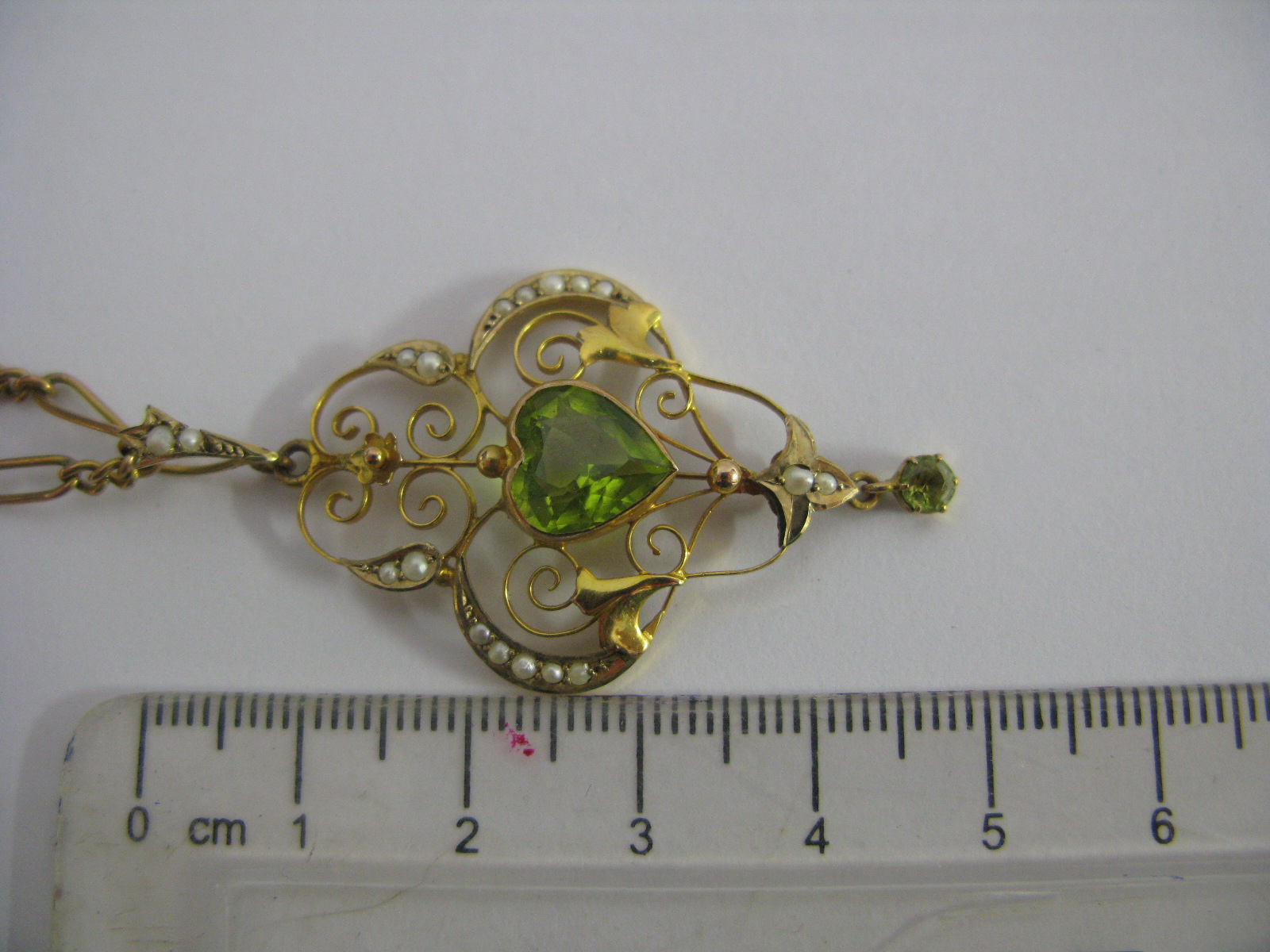 An Edwardian Openwork Pendant, heart shape collet set to the centre, with pearl highlights, - Image 3 of 5