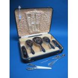 A Matched Hallmarked Silver and Piqué Work Eight Piece Ladies Dressing Set, Walker & Hall,