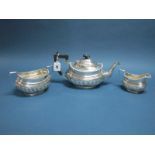 A Hallmarked Silver Three Piece Teaset, CW, Birmingham 1904, each with gadrooned edge and angular