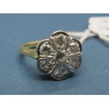 A Modern 18ct Gold Seven Stone Diamond Set Cluster Ring, of flowerhead design, set throughout with