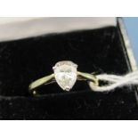 An 18ct Gold Pear Shape Single Stone Diamond Ring, the (7mm long) stone claw set.