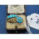 A XIX Century Turquoise Set Ring, of cluster design, between openwork scroll shoulders; Together