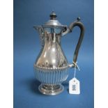 A Hallmarked Silver Hot Water Pot, Messrs Hutton, Sheffield 1911, of baluster form, semi reeded,