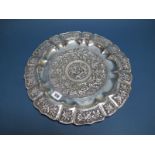 A Charger, of shaped circular form, pierced and detailed in relief with exotic birds, flowers and