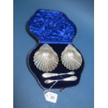 A Pair of Hallmarked Silver Shell Butter Dishes, Mappin & Webb, Sheffield 1905, each raised on three