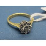 An 18ct Gold Single Stone Diamond Ring, the brilliant cut stone illusion set.