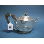 A Hallmarked Silver Teapot, Messrs Hutton, London 1903, of oval semi reeded form, 510grams.