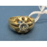 A Single Stone Diamond Ring, of Victorian style, the brilliant cut stone reeded claw set, stamped "