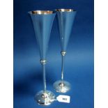 A Pair of Britannia Standard Hallmarked Silver Champagne Flutes, R. Carr Ltd, Sheffield 2000, 29.