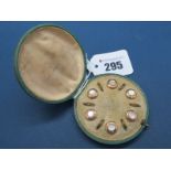 A Set of Six Gent's Dress Buttons, each set with mother of pearl, in original fitted case.