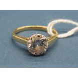 An 18ct Gold Single Stone Diamond Ring, the (7mm) brilliant cut stone claw set.