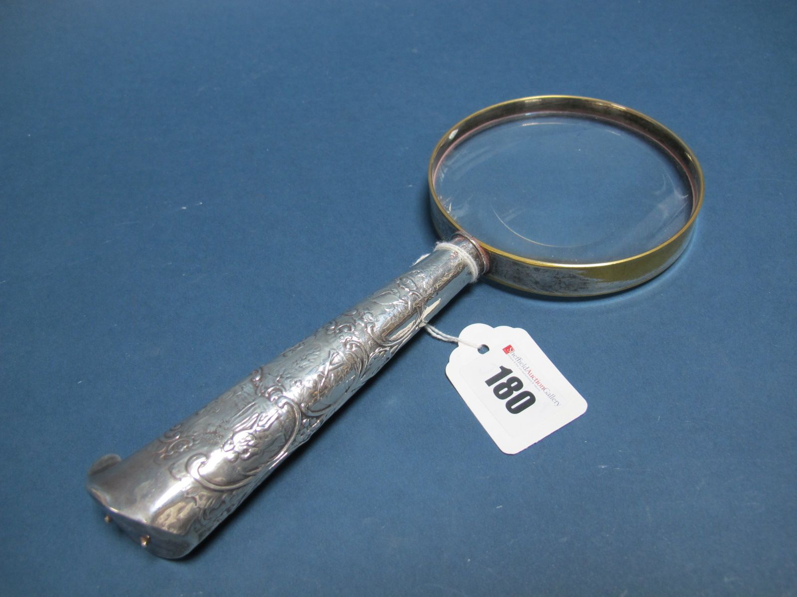 A Dutch Magnifying Glass, bearing import marks for London 1899, the decorative tapering handle