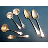 A Pair of Hallmarked Silver Berry Spoons, JW, London (possibly 1809), each with detailed handle