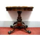 A Mid XIX Century Walnut Fold-Over Tea Table, the shaped top with moulded edge, baized interior,