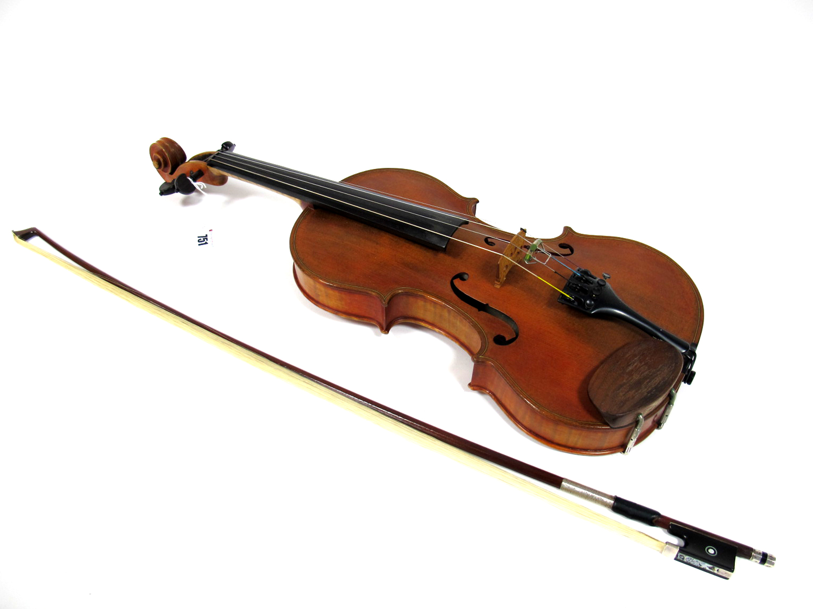 A Violin, one-piece back, length 137/8 in, inlaid purfling, ebony finger board, rosewood pegs,