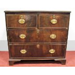 A XIX Century Mahogany Chest of Drawers, the rectangular top with moulded edge, fitted with two