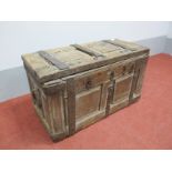 A XVI - XVII Century Small Joined Oak Blanket Box, the twin panelled top with iron straps,
