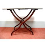 A XIX Century Mahogany Coaching Table, fold-over action, shaped legs with turned stretchers, 69cm